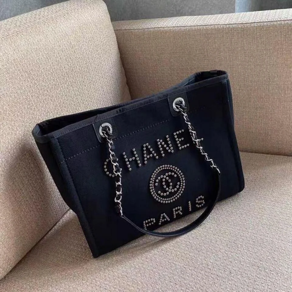 CHANEL金屬珠LOGO購物沙灘包(小號)